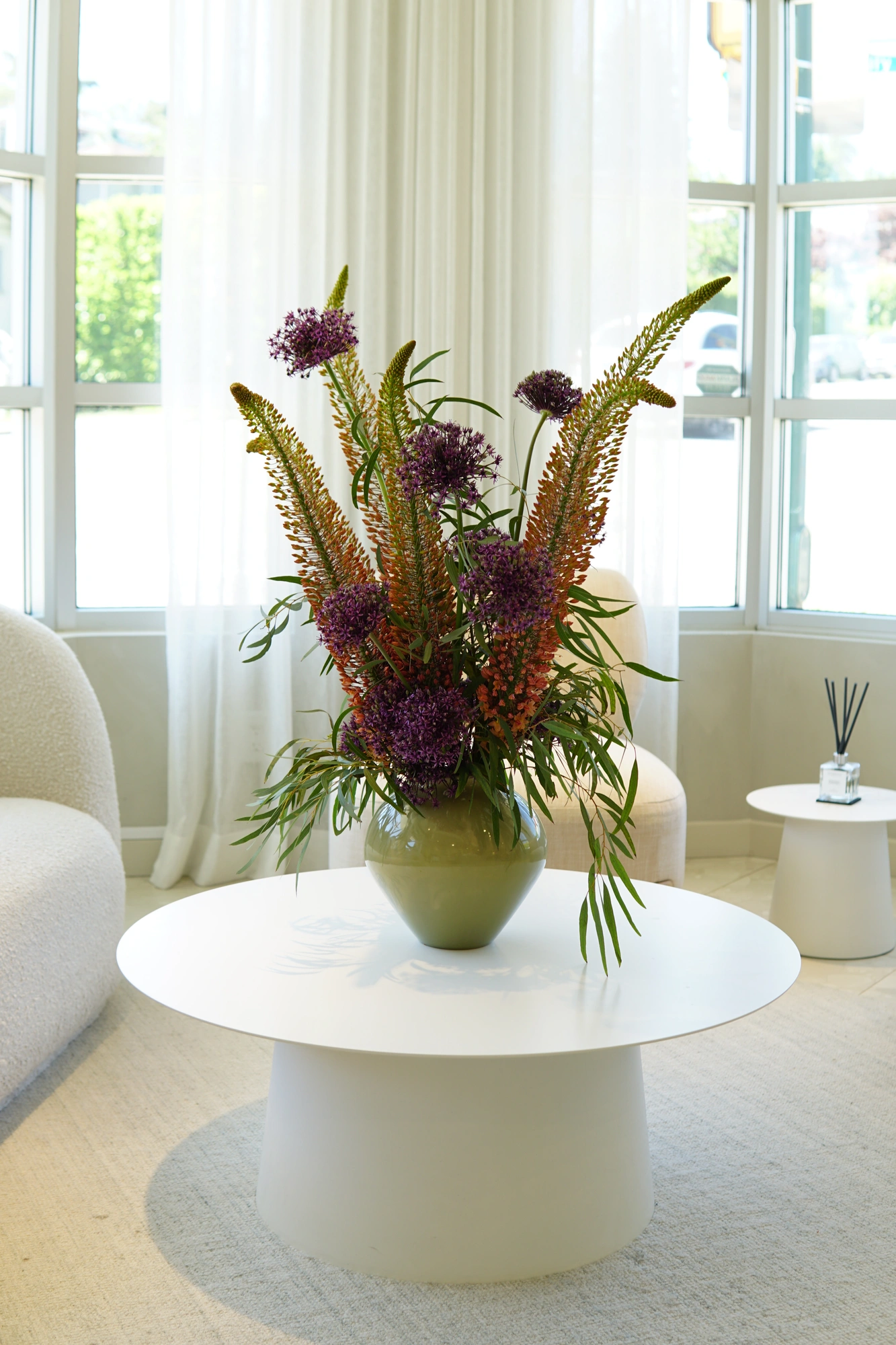 Standing floral subscription arrangement at Body & Soul Wellness