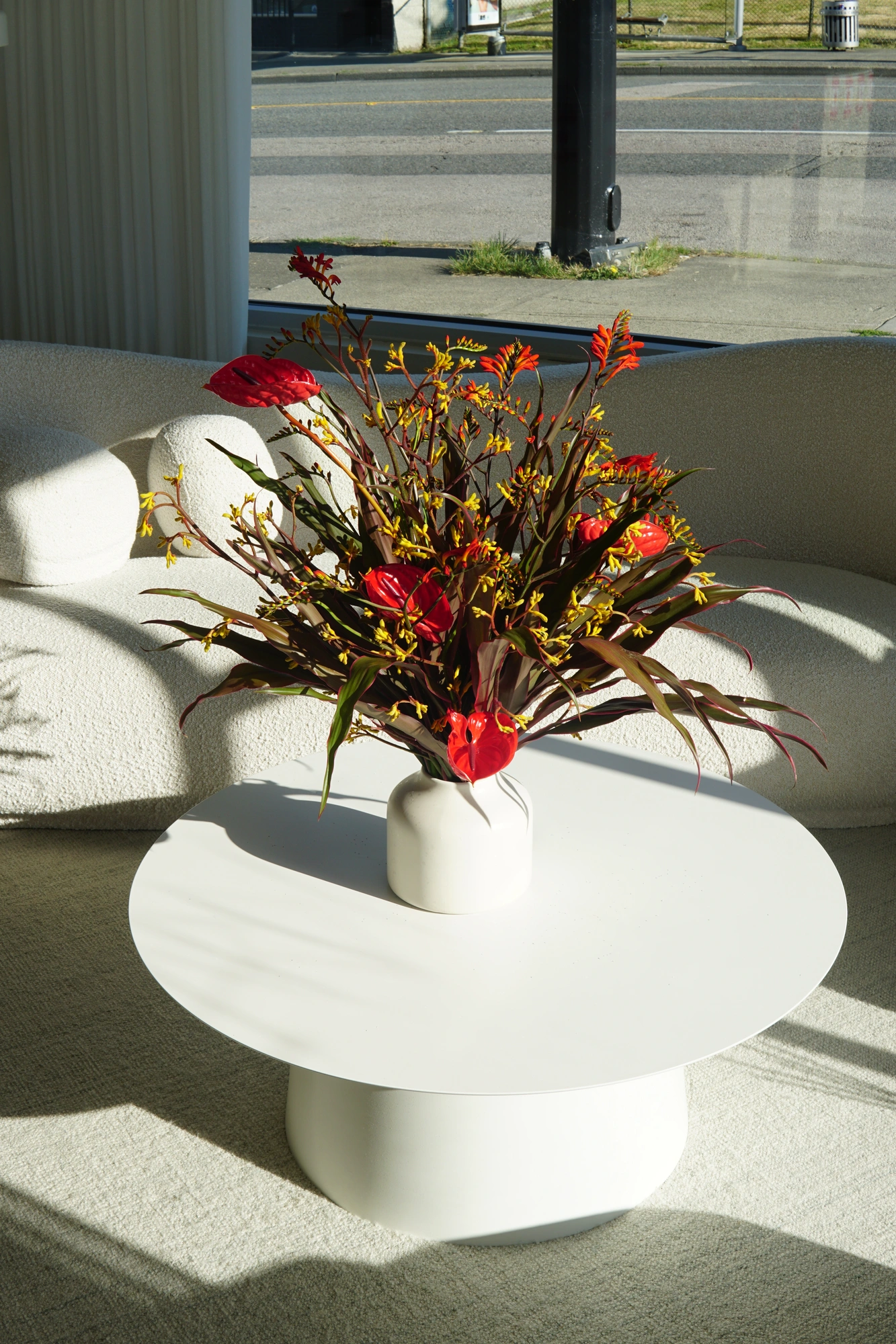 Tall floral composition in the wellness lounge