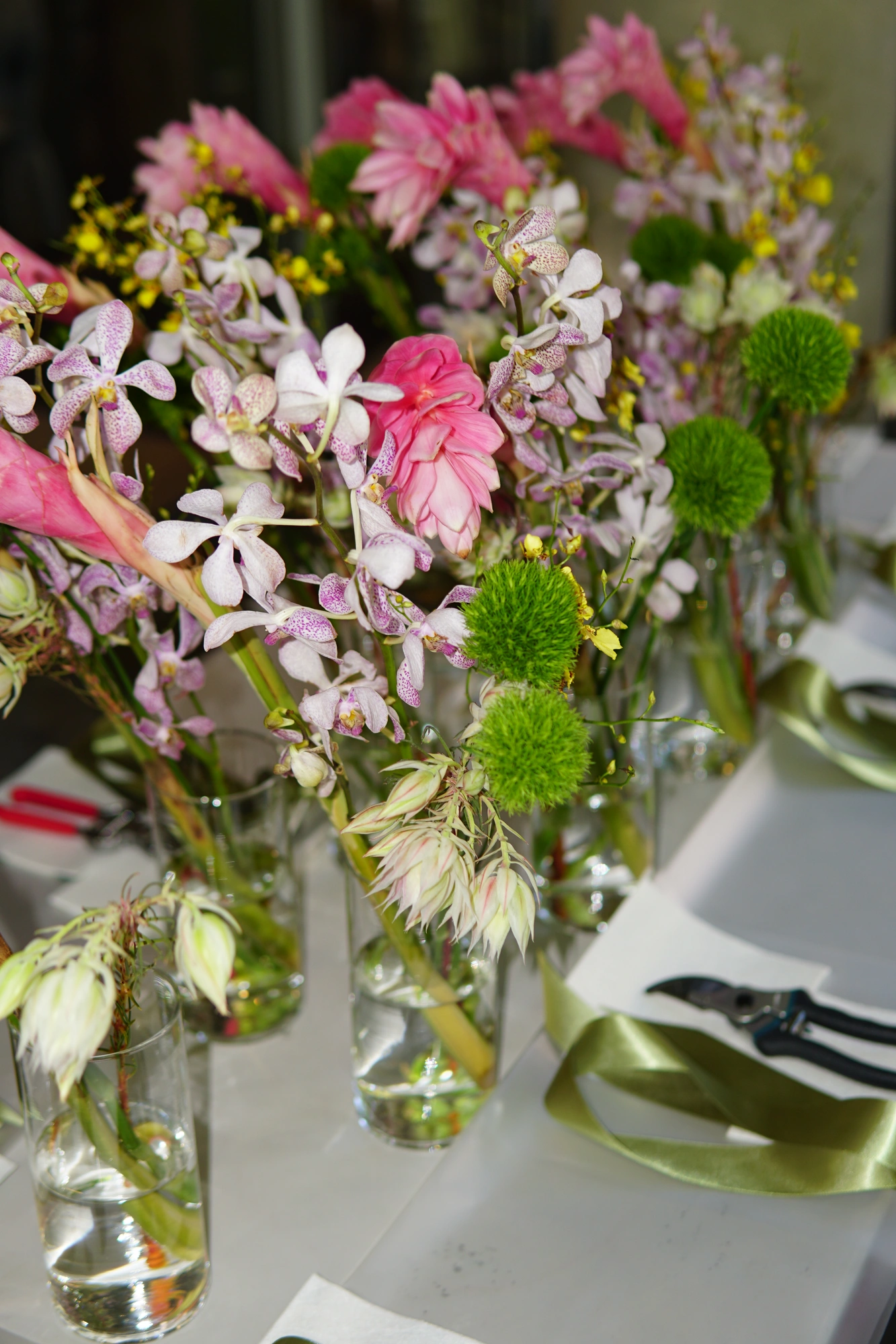 Finished workshop florals on the shared table
